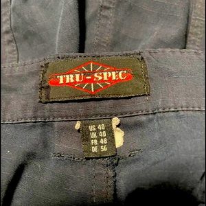 Well loved and well used men’s TRU-SPEC tactical pants.